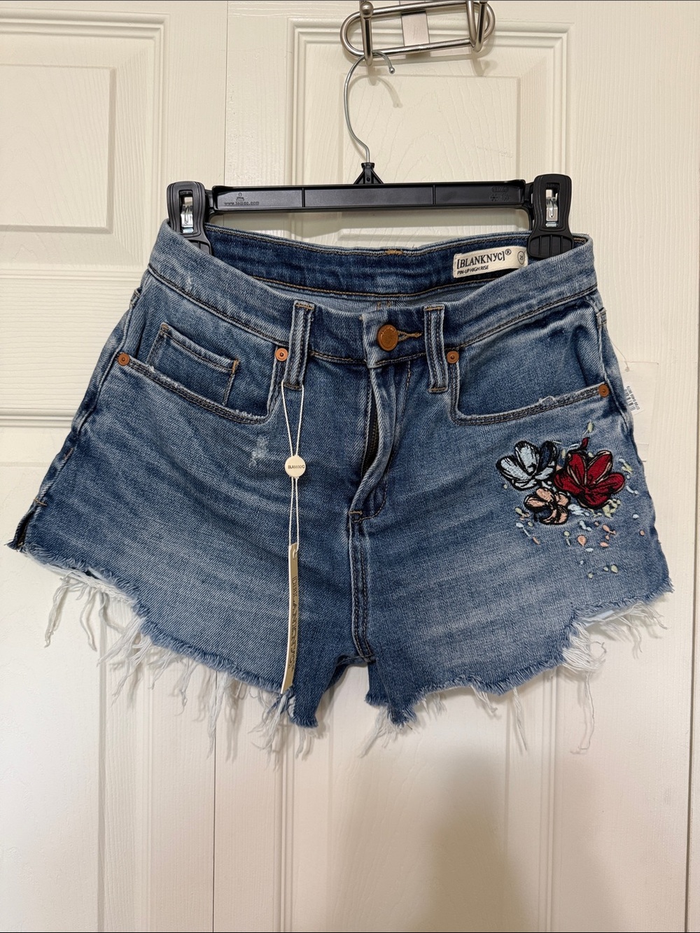 Blank NYC Denim Cutoff Shorts with Red & White Floral Patch